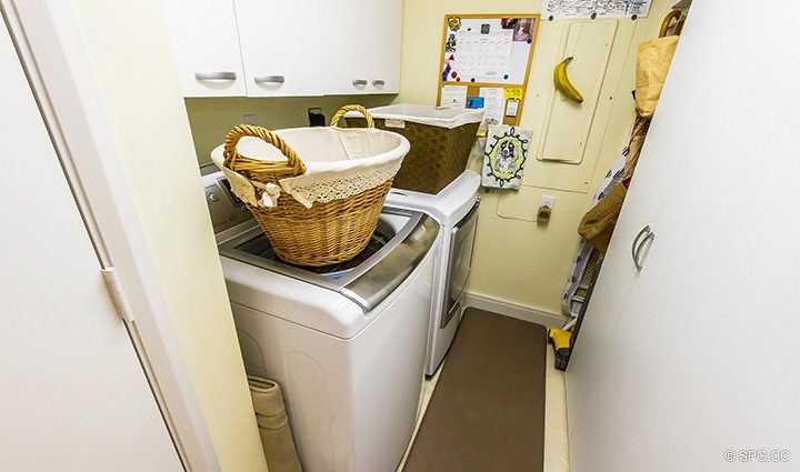 Laundry Room inside Residence R1C1 at The Stratford, Luxury Oceanfront Condominiums in Palm Beach, Florida 33480.