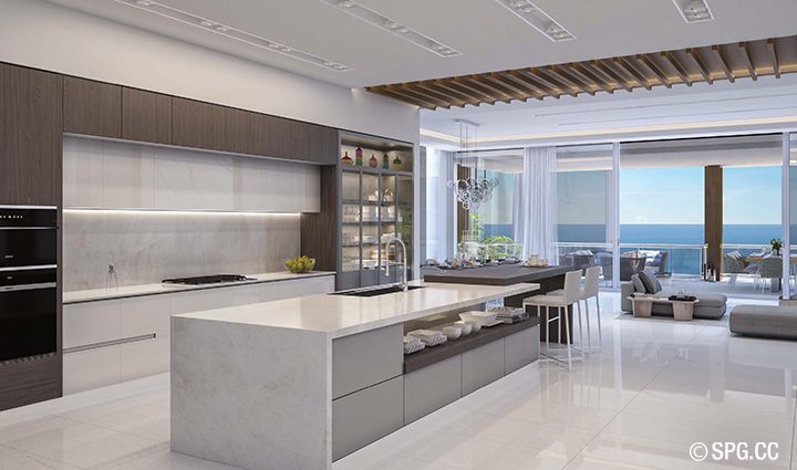 The kitchen, with an oversized entertainment island for social gatherings, is a gourmet’s delight.